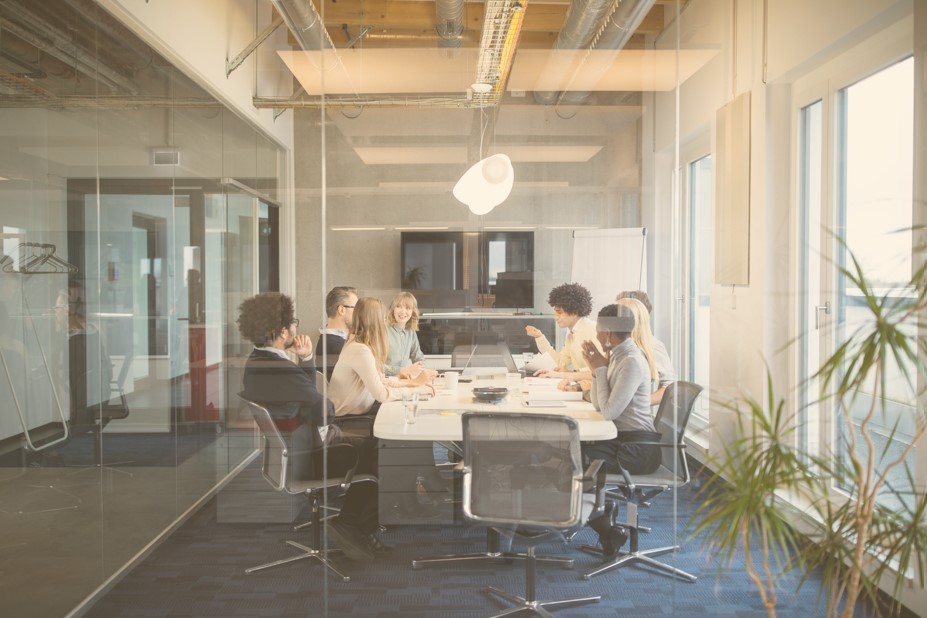 A leadership team collaborating in a modern office